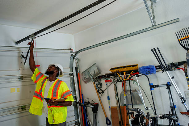 Professional Garage Door Panel Replacement technician working in Monroe County County, NY